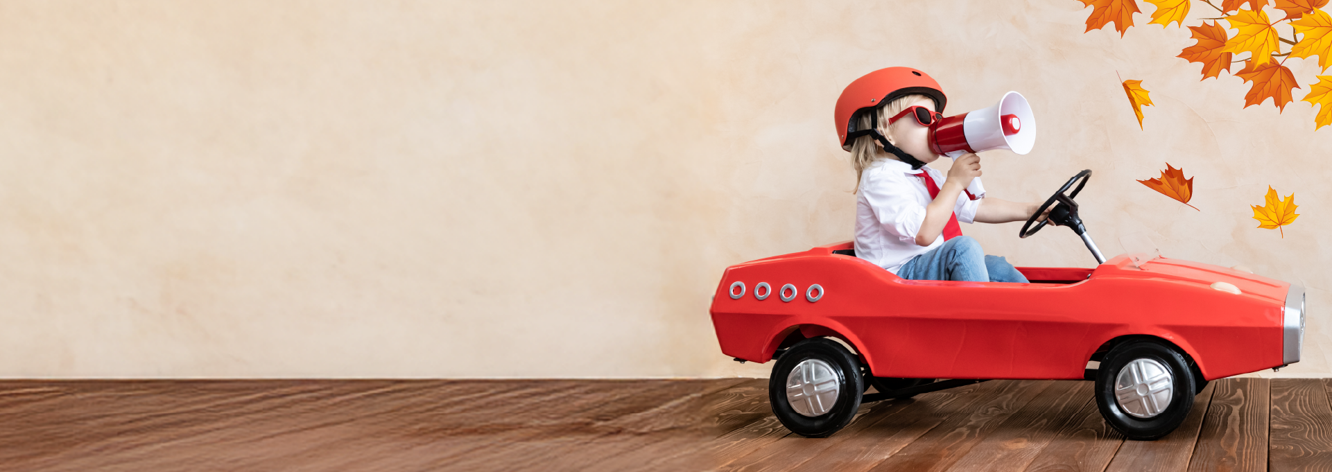 child driving toy car representing car insurance
