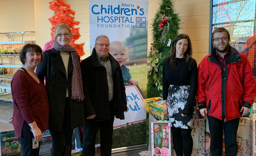 Western Financial Group team including CEO and President Kenny Nicholls deliver donated toys to Alberta Children's Hospital