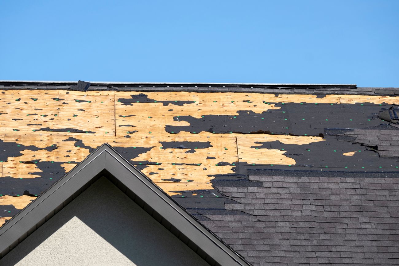 Hail-damaged roof shingles on a home in Medicine Hat, Alberta