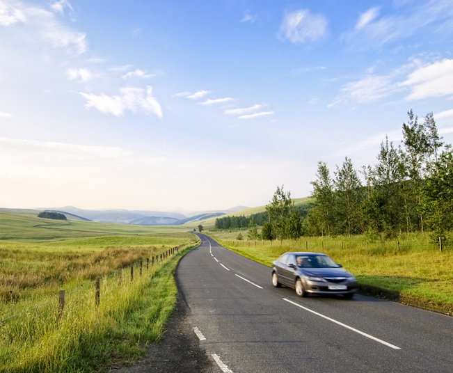 Car driving alone on a highway