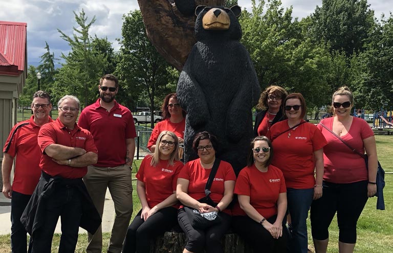 A group of 10 Western Financial Group employees, including CEO and president Kenny Nicholls, during the 2018 Support the Cause walk in Kelowna