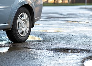 Happy Spring! How to Navigate Potholes 