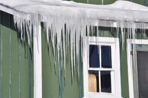 Is Roof Damage Caused by Ice Damming Covered by Home Insurance?